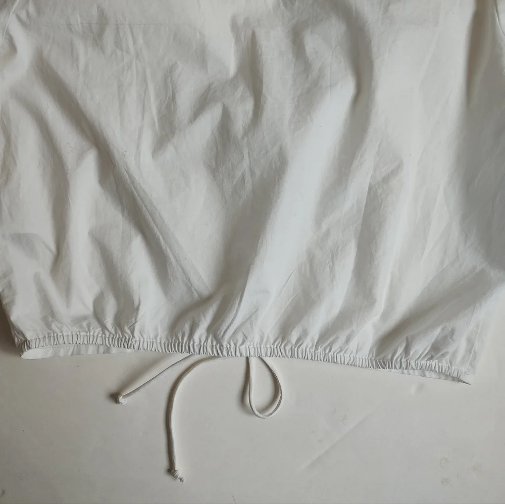 Maeve White Ruffled V-Neck Drawstring Blouse
